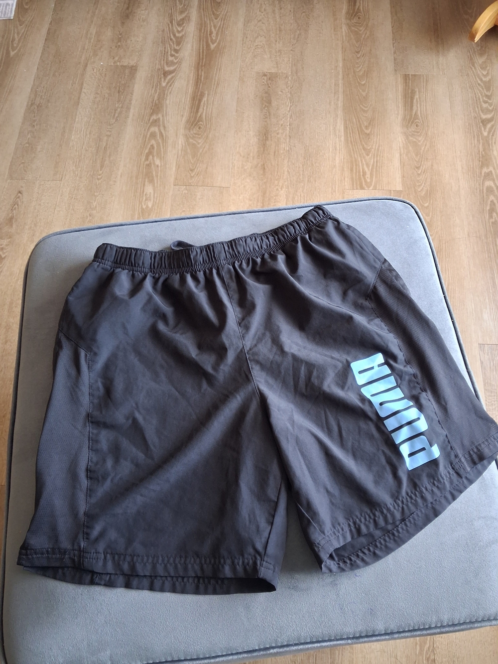 Puma Black Athletic Shorts with Light Blue Logo